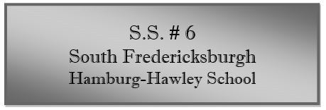 A close-up of a sign
Description automatically generated